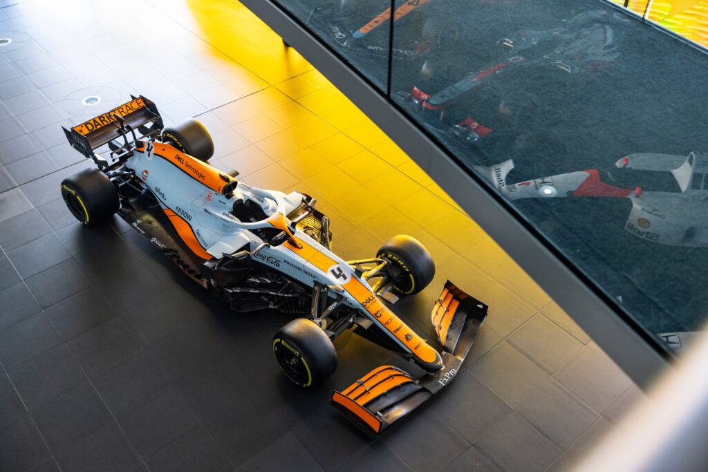 Overhead view of a 2021 McLaren MCL35M Formula 1 car in pale blue and orange Gulf livery